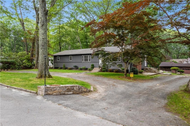 226 Quaker Ln, Scituate, RI 02857 - ranch-style home featuring driveway and a front lawn
