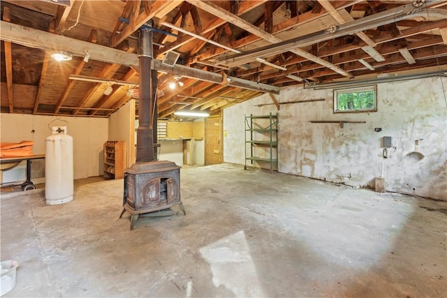 226 Quaker Ln, Scituate, RI 02857 - below grade area featuring a wood stove