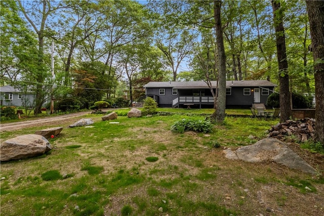 226 Quaker Ln, Scituate, RI 02857 - view of green lawn with a deck