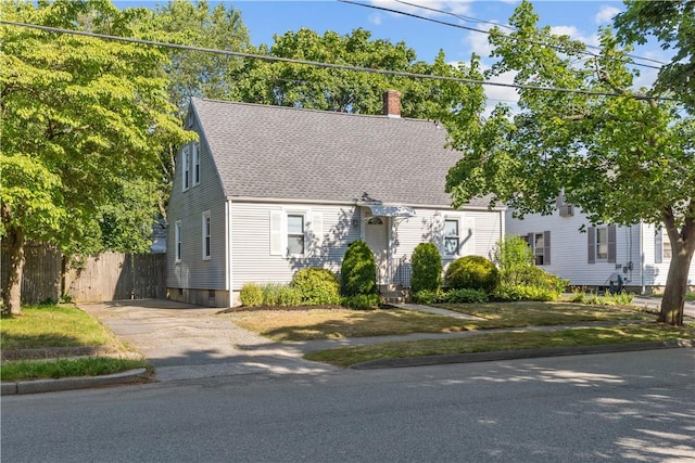 74 Park View Blvd, Cranston, RI 02910 - cape cod house featuring driveway, roof with shingles, and a chimney