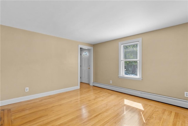74 Park View Blvd, Cranston, RI 02910 - unfurnished room featuring a baseboard radiator and wood finished floors