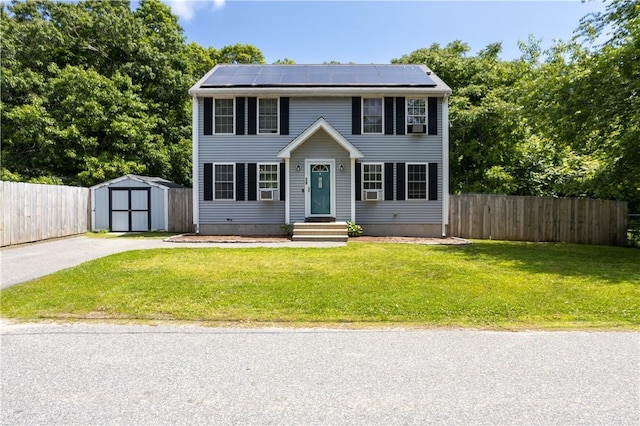 39 Old Onset Rd, Wareham, MA 02558 - colonial-style house featuring a storage unit, solar panels, and entry steps