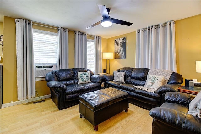 39 Old Onset Rd, Wareham, MA 02558 - living room featuring light wood finished floors, a ceiling fan, and cooling unit