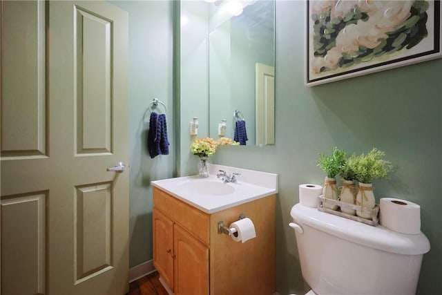 685 Social St Unit 103, Woonsocket, RI 02895 - bathroom featuring vanity and toilet