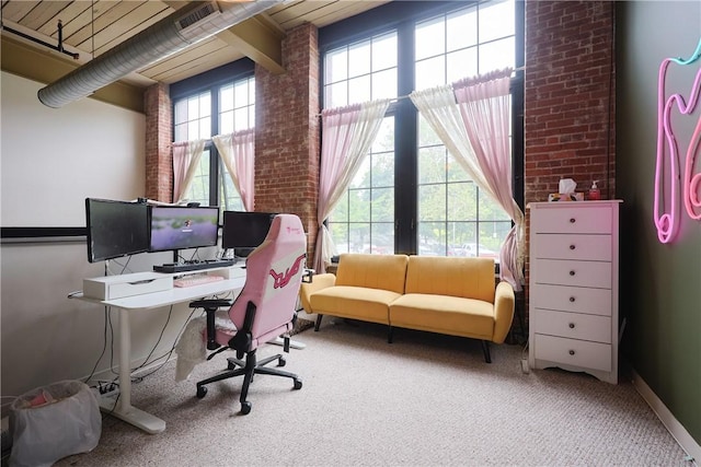 685 Social St Unit 103, Woonsocket, RI 02895 - carpeted office space featuring baseboards and brick wall