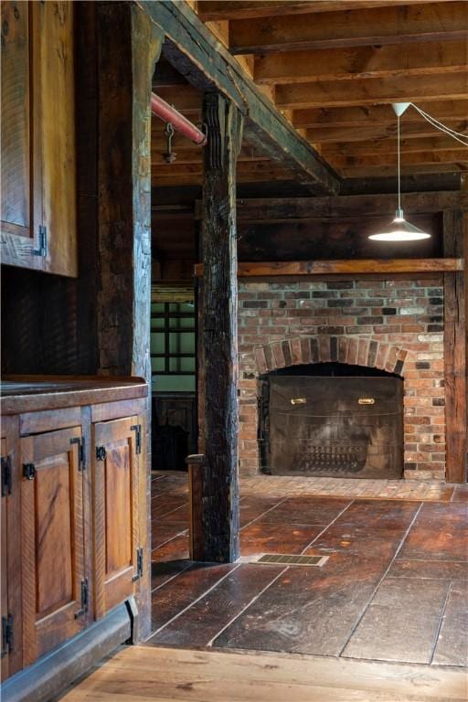 84 Skunk Hill Rd, Hopkinton, RI 02832 - living area with a fireplace and dark wood-style floors