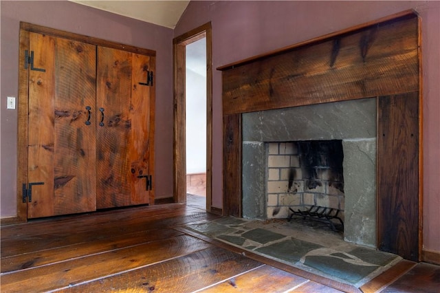 84 Skunk Hill Rd, Hopkinton, RI 02832 - detailed view of wood finished floors and a fireplace