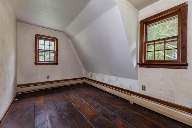 84 Skunk Hill Rd, Hopkinton, RI 02832 - additional living space with dark wood-style floors, vaulted ceiling, and a baseboard heating unit