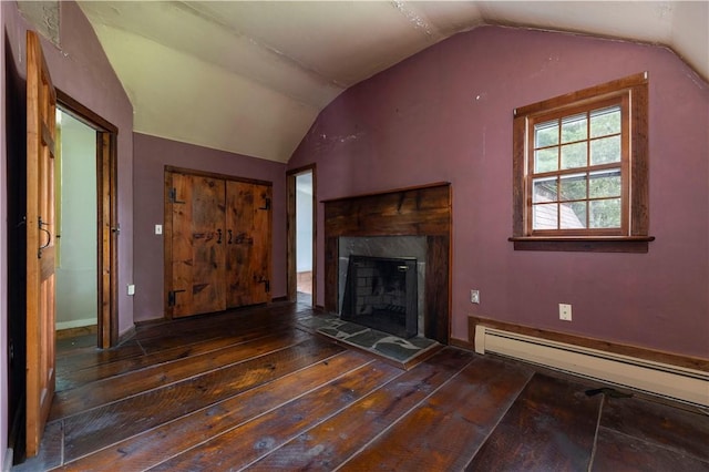 84 Skunk Hill Rd, Hopkinton, RI 02832 - unfurnished living room featuring wood-type flooring, lofted ceiling, baseboard heating, and a fireplace with raised hearth