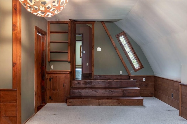 84 Skunk Hill Rd, Hopkinton, RI 02832 - stairway featuring carpet, lofted ceiling, wood walls, and wainscoting