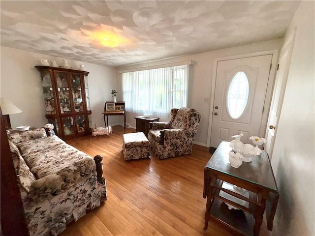 51 Old Carriage Rd, West Warwick, RI 02893 - living area with light wood finished floors and baseboards