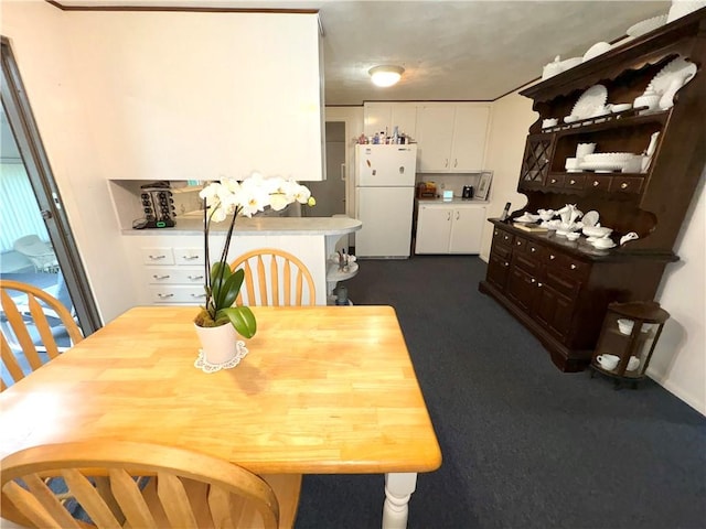 51 Old Carriage Rd, West Warwick, RI 02893 - dining room featuring dark colored carpet