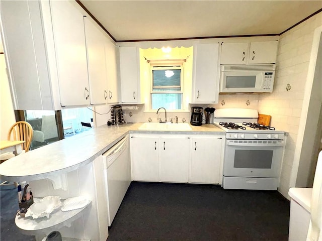 51 Old Carriage Rd, West Warwick, RI 02893 - kitchen featuring white appliances, light countertops, white cabinets, and a peninsula