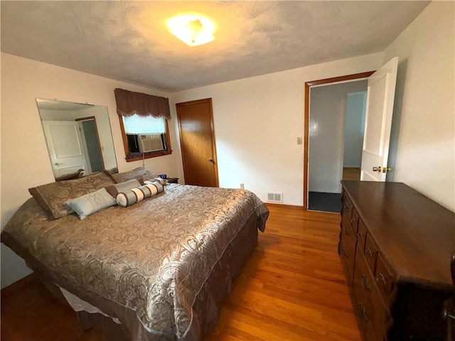 51 Old Carriage Rd, West Warwick, RI 02893 - bedroom featuring wood finished floors and cooling unit