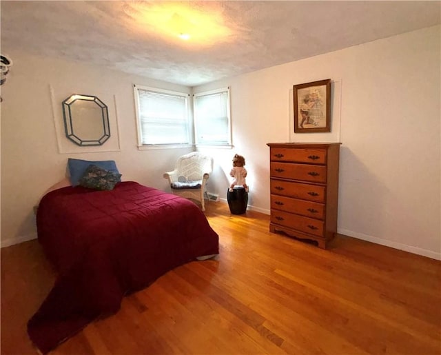 51 Old Carriage Rd, West Warwick, RI 02893 - bedroom with light wood finished floors and baseboards