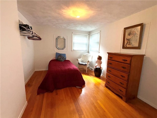 51 Old Carriage Rd, West Warwick, RI 02893 - bedroom featuring light wood-type flooring