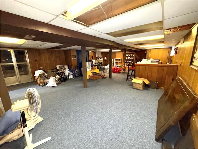 51 Old Carriage Rd, West Warwick, RI 02893 - below grade area featuring wood walls and a paneled ceiling
