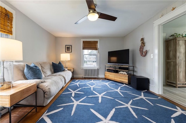 39 Chester Ave, Westerly, RI 02891 - living room with radiator heating unit, a ceiling fan, and wood finished floors