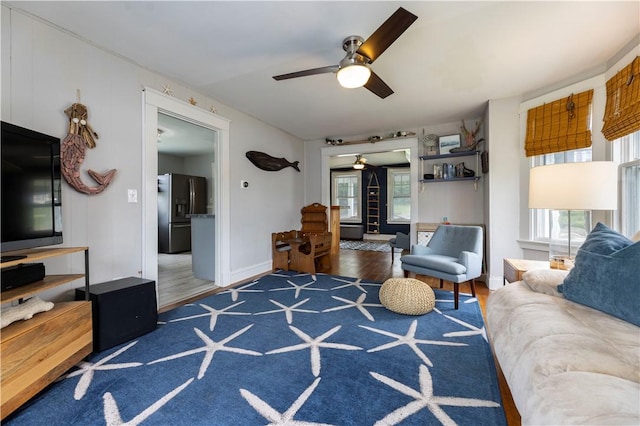 39 Chester Ave, Westerly, RI 02891 - living area with ceiling fan, healthy amount of natural light, and wood finished floors