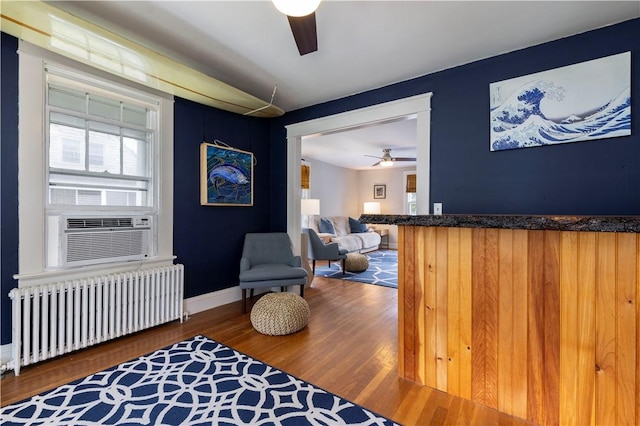 39 Chester Ave, Westerly, RI 02891 - sitting room featuring radiator, a ceiling fan, wood finished floors, and cooling unit