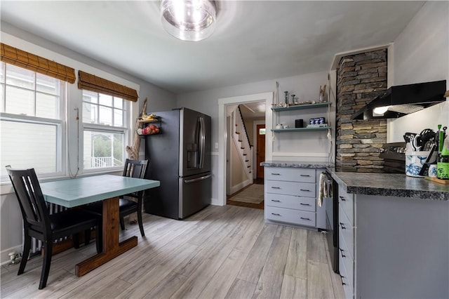 39 Chester Ave, Westerly, RI 02891 - kitchen with stainless steel fridge with ice dispenser, black electric range, light wood-style floors, ventilation hood, and open shelves