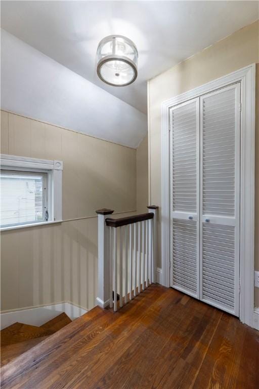 39 Chester Ave, Westerly, RI 02891 - corridor with an upstairs landing, wood finished floors, and vaulted ceiling