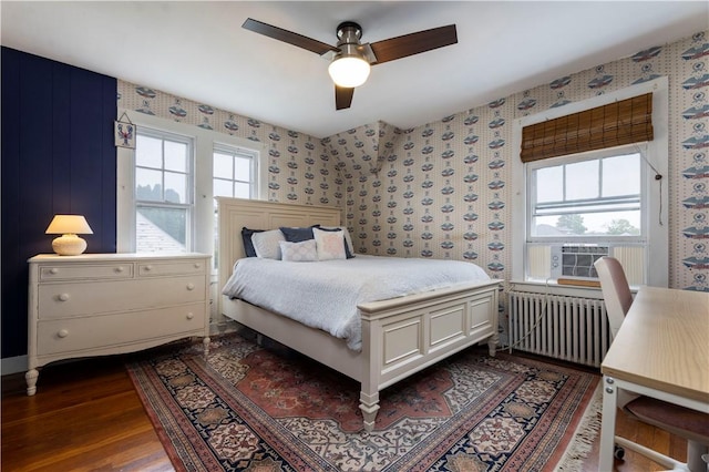 39 Chester Ave, Westerly, RI 02891 - bedroom featuring radiator heating unit, dark wood-style flooring, cooling unit, wallpapered walls, and ceiling fan