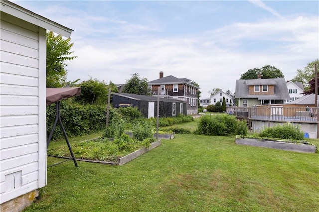 39 Chester Ave, Westerly, RI 02891 - view of grassy yard featuring a vegetable garden and a residential view
