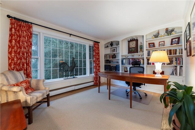 38 Setting Sun Dr, Westerly, RI 02891 - home office featuring crown molding, a baseboard heating unit, and built in shelves
