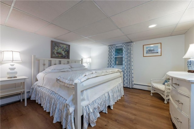 38 Setting Sun Dr, Westerly, RI 02891 - bedroom featuring a baseboard radiator, wood finished floors, a drop ceiling, and recessed lighting