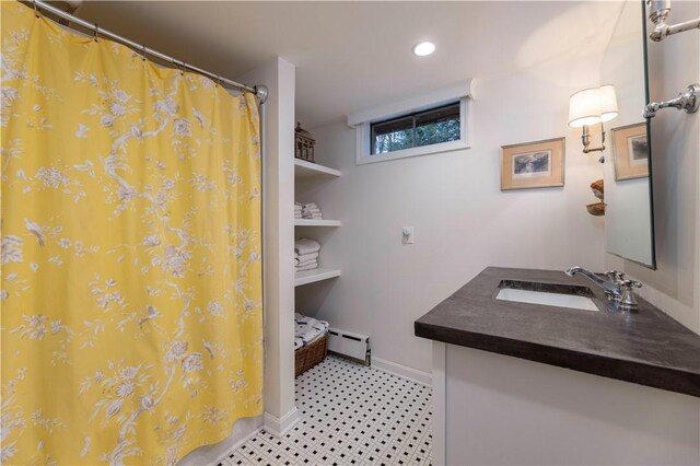 38 Setting Sun Dr, Westerly, RI 02891 - full bath with vanity, a baseboard radiator, tile patterned floors, recessed lighting, and curtained shower
