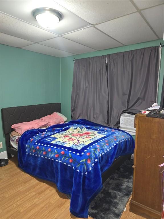 33 Chambers St, Providence, RI 02907 - bedroom featuring a paneled ceiling and wood finished floors