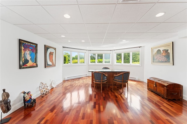 27 Eagle Dr, North Kingstown, RI 02852 - dining space featuring a baseboard heating unit, wood finished floors, plenty of natural light, recessed lighting, and a drop ceiling