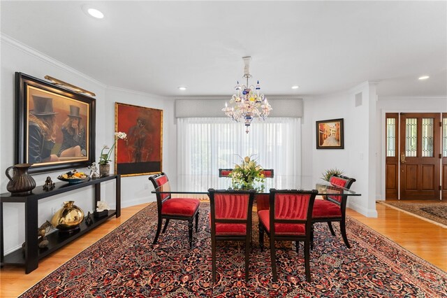 27 Eagle Dr, North Kingstown, RI 02852 - dining room featuring light wood-style floors, ornamental molding, a chandelier, and recessed lighting