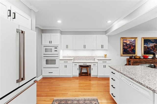 27 Eagle Dr, North Kingstown, RI 02852 - kitchen featuring white appliances, crown molding, recessed lighting, white cabinets, and light wood finished floors
