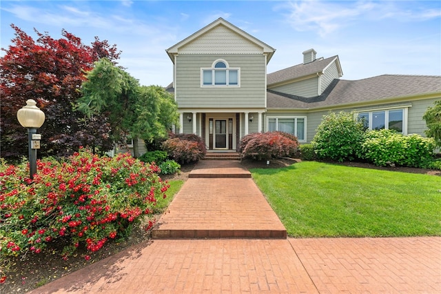 27 Eagle Dr, North Kingstown, RI 02852 - victorian house with a front lawn and a shingled roof