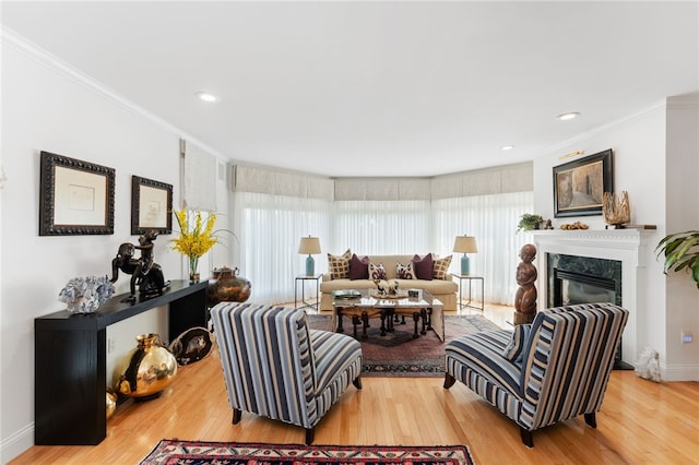 27 Eagle Dr, North Kingstown, RI 02852 - living area featuring ornamental molding, wood finished floors, a fireplace, and recessed lighting