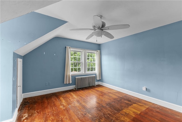 509 W Shore Rd, Warwick, RI 02889 - additional living space with radiator, ceiling fan, wood finished floors, and vaulted ceiling