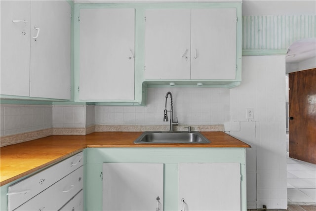 509 W Shore Rd, Warwick, RI 02889 - kitchen featuring backsplash and light countertops