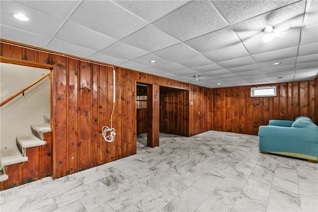 509 W Shore Rd, Warwick, RI 02889 - basement featuring wood walls, stairway, recessed lighting, and marble finish flooring