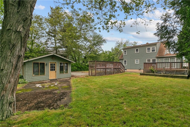 509 W Shore Rd, Warwick, RI 02889 - view of grassy yard with a deck