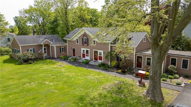 97 Narragansett Ave Unit C4, Newport, RI 02840 - colonial-style house with entry steps and a front lawn