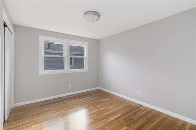 17 Victor Emanuel Ave, Providence, RI 02904 - empty room with baseboards and light wood-style flooring