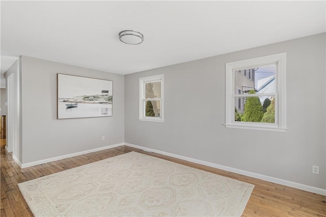 17 Victor Emanuel Ave, Providence, RI 02904 - empty room featuring wood finished floors and baseboards