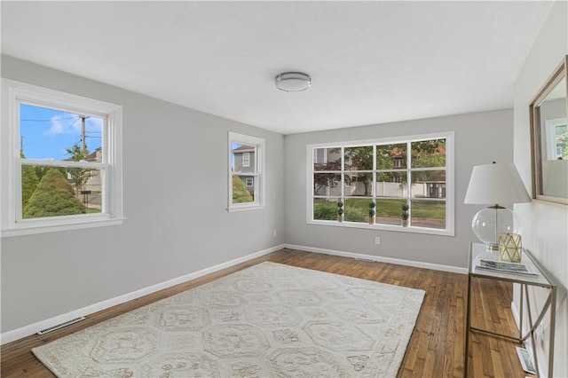 17 Victor Emanuel Ave, Providence, RI 02904 - unfurnished room with healthy amount of natural light and hardwood / wood-style floors