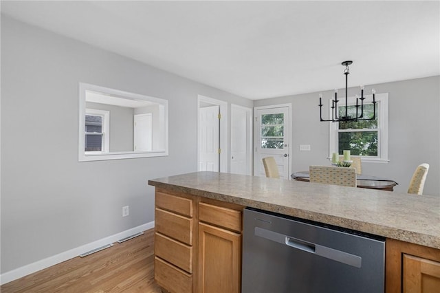 17 Victor Emanuel Ave, Providence, RI 02904 - kitchen featuring stainless steel dishwasher, light wood finished floors, a chandelier, decorative light fixtures, and brown cabinets