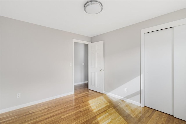 17 Victor Emanuel Ave, Providence, RI 02904 - unfurnished bedroom featuring light wood finished floors and a closet