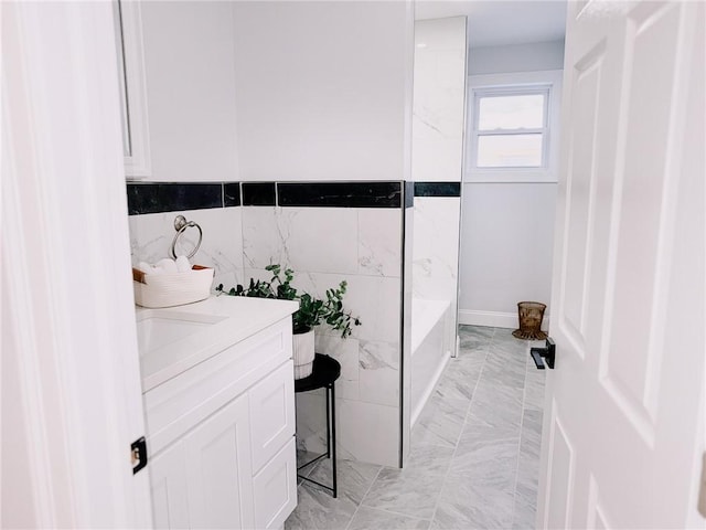 945 Danielson Pike, Scituate, RI 02857 - full bath featuring marble look tile flooring, a bath, and vanity