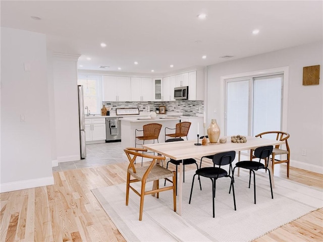 945 Danielson Pike, Scituate, RI 02857 - dining space with light wood finished floors and recessed lighting