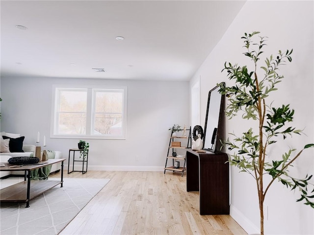 945 Danielson Pike, Scituate, RI 02857 - living area featuring light wood-type flooring and baseboards
